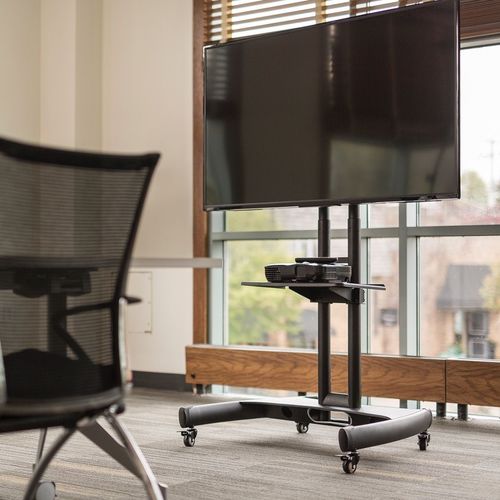 Suporte de piso para TV contemporâneo - FP2500 - Luxor - com rodízios / em aço / da linha comercial