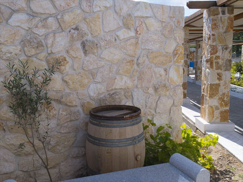 Revestimento de fachada em folhas - YELLOW - Akrolithos S.A. - em pedra natural / texturizado