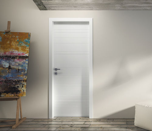 Porta interna - NIDIO - Flessya - em madeira / de abrir / sem vidros