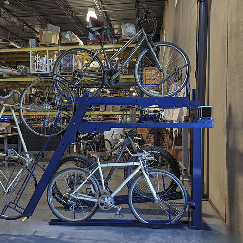 Bicicletário de piso - BIKE BOOST STORAGE - Madrax - com sistema de segurança / de dois andares / para área interna