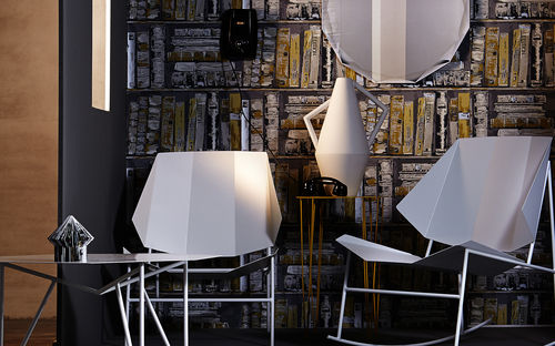 Cadeira contemporânea - TERRA - Atipico - para ambiente interno / em ferro / de balanço