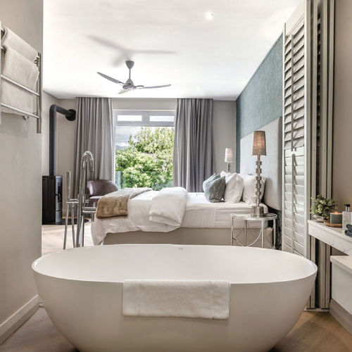 Banheira oval - ALANA - Livingstone Baths - freestanding / de resina / em pedra