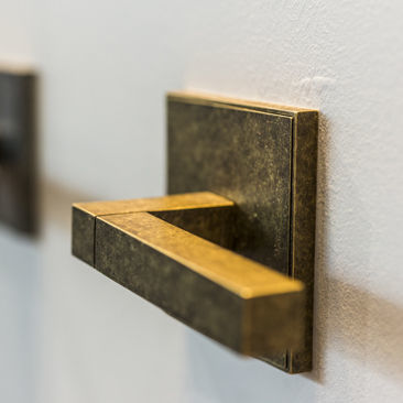 Maçaneta para porta - SUPERNOVA  - Lithoss - em aço inoxidável / contemporânea / da linha residencial