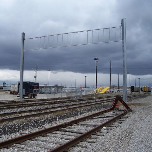 Portão guilhotina - FORTRESS - Tymetal Corp - em alumínio / em tela metálica / motorizado