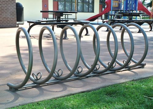 Bicicletário de piso - SPIRAL - CANTERBURY DESIGNS - para espaço público / em aço inoxidável / em alumínio