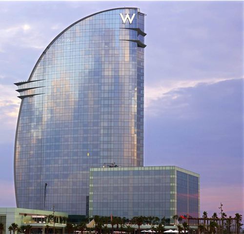 Fachada em alumínio - W HÔTEL - BARCELONA - Cantori srl - para quebra-sol / resistente às intempéries / perfurada