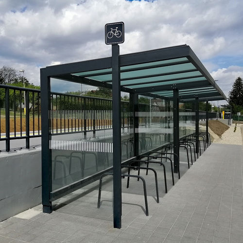 Abrigo para bicicletas modular - FRAMEO CYKLO - STREETPARK s.r.o. - em aço / para espaço público / para áreas urbanas