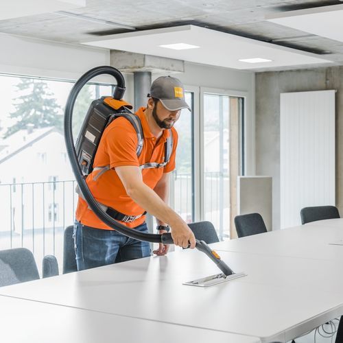 Aspirador da linha comercial - AERO BP E & B - TASKI - costal / para matérias secas / com bateria recarregável