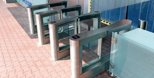 Catraca de portas retráteis para fluxo elevado - SPEEDSTILE FL OUTDOOR - GUNNEBO ENTRANCE CONTROL - de vidro / de segurança / de alumínio