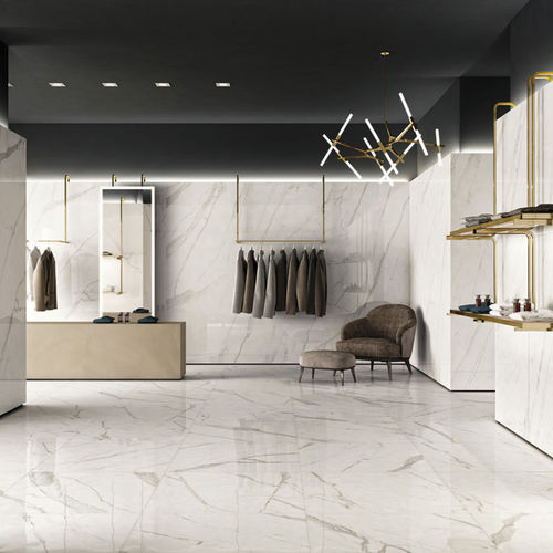 Placas de revestimento em grés porcelanato - TRILOGY 0.3 : CALACATTA WHITE - Panaria ceramica - polida / brilhante / para ambiente interno
