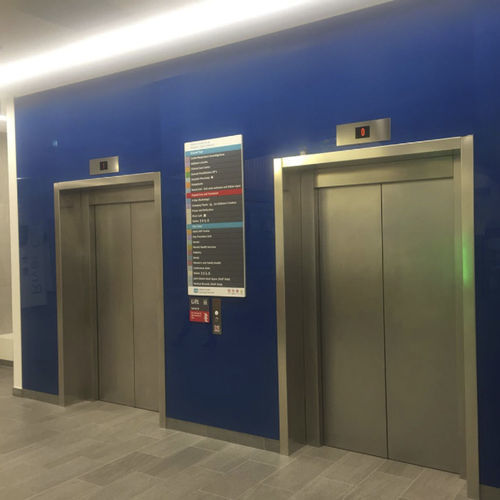 Revestimento para parede interna - Specialist Joinery Group - em vidro / polido / espelhado