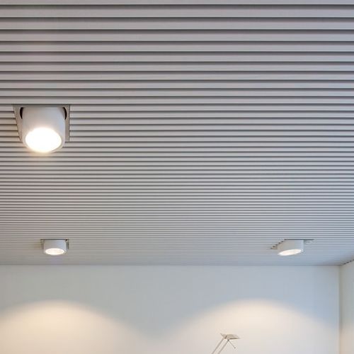 Forro em concreto - Luxalon® 30BD / 30BXD CCA - Hunter Douglas Architectural - em réguas / para escritório / para sala de conferências