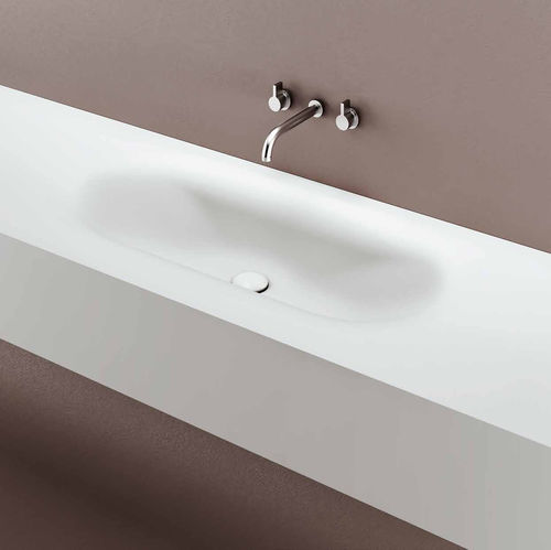 Cuba integrada - MOBY - PLANIT - em Corian® / com tampo / oval