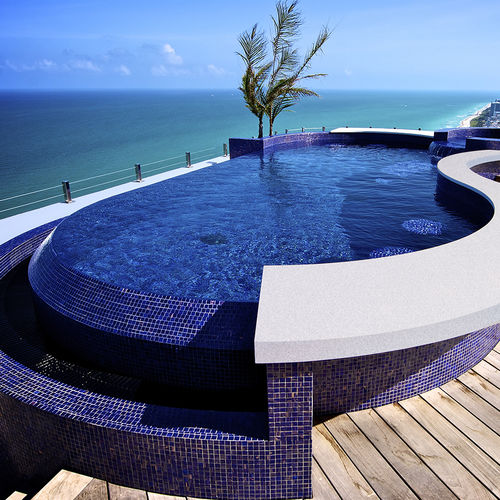 Piscina com transbordo - AKOYA PENTHOUSE  - Bradford Products LLC - sob medida / para ambiente externo / semienterrada