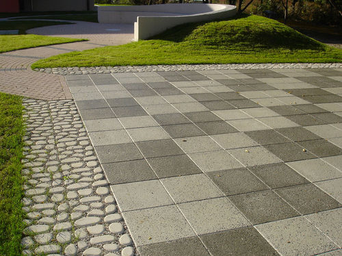 Placas de revestimento em concreto - DOLOMITE - FAVARO1 - polida / para ambiente externo / de piso