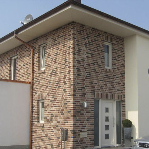 Tijolo aparente de terracota - ARIANE - Vandersanden Group - para fachada / com relevo / vermelho