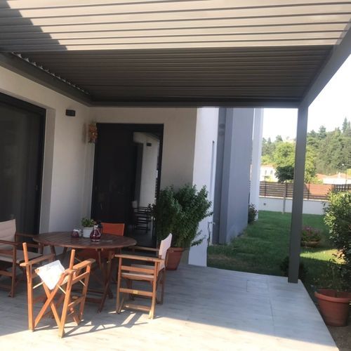 Pérgola apoiada em parede - CospiBio - COSPICON  SA - em alumínio / com lâminas orientáveis / com lâminas quebra-sol