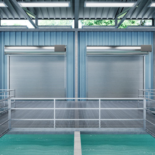 Porta industrial de enrolar - ESD series - Cornell - em aço inoxidável / de segurança / de saída de emergência