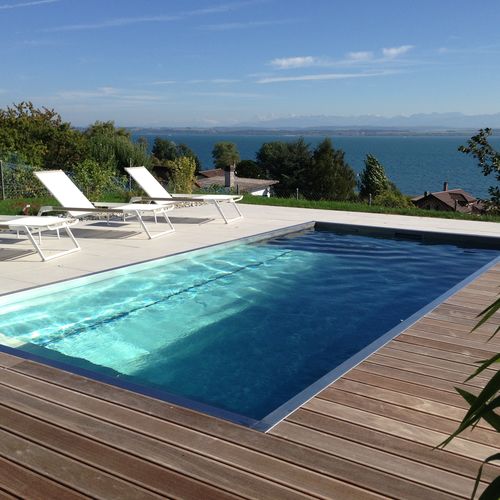 Piscina pré-fabricada - Steel And Style - com transbordo / corredor de natação / sob medida