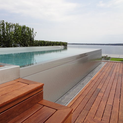 Piscina pré-fabricada - Steel And Style - com transbordo / corredor de natação / sob medida