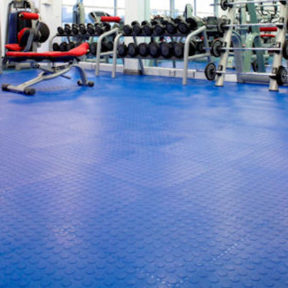 Revestimento de piso em borracha - SAARFLOOR NOPPE STUD - Polyflor - para ambiente interno / para o setor terciário / em placas
