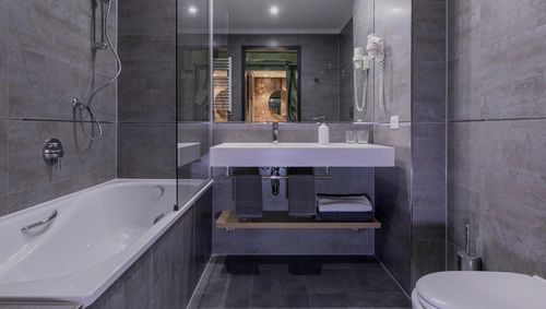Banheiro contemporâneo - MODULAR BATHROOM DESIGN - eurocomponents spa - em concreto armado / para hotel / para centro comercial
