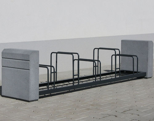 Bicicletário de piso - BRNO - Komserwis Sp. z o.o. - para espaço público / em aço pintado / em concreto