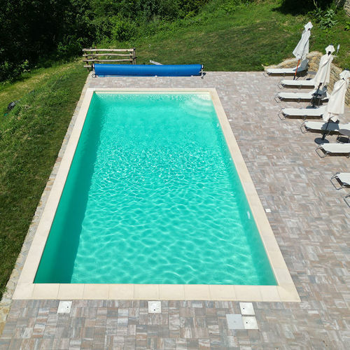 Piscina com transbordo - Classica - Piscine Acquaform - coberta / sob medida / com borda
