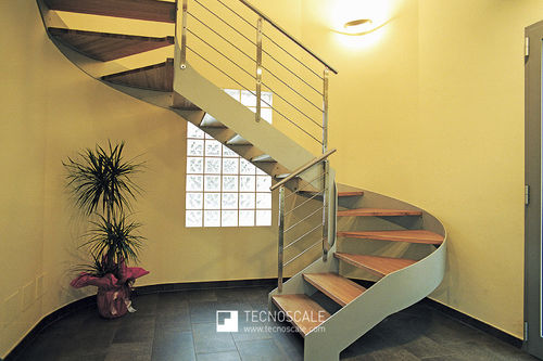 Escada helicoidal - HELICAL  - TECNOSCALE - curva / com degraus em madeira / com degraus em metal