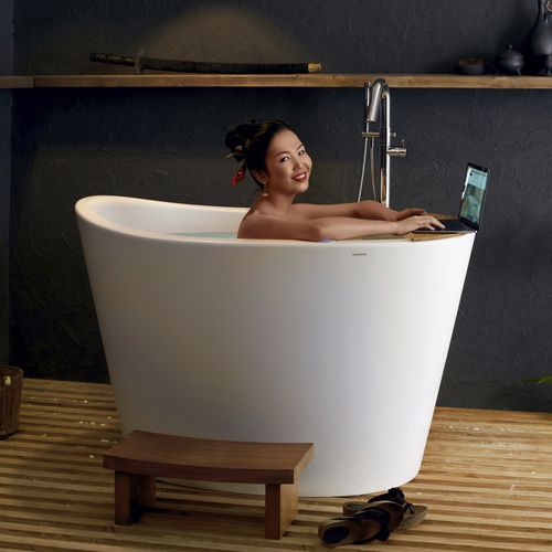 Banheira oval - TRUE OFURO TRANQUILITY - Aquatica Marmite SP. Z.o.o - freestanding / para residência / em Solid Surface