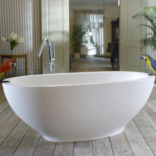Banheira oval - KAROLINA 2 - Aquatica Marmite SP. Z.o.o - freestanding / para residência / em Solid Surface