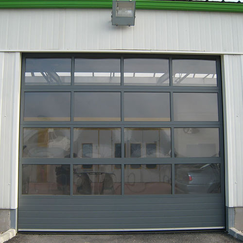 Porta industrial seccionada - FULL VISION - SMF Services - metálica / automática / para hangar