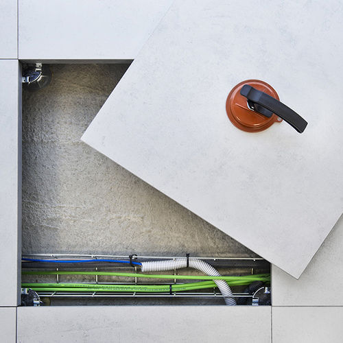 Piso elevado em aglomerado - DINOR - em madeira / em sulfato de cálcio / em grés porcelanato