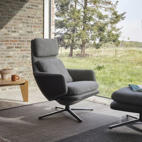 Poltrona contemporânea - vitra - em couro / em alumínio fundido / com almofada removível