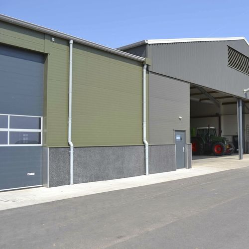 Revestimento de fachada em painéis - COLORFARM® - TATA STEEL - em aço / liso / efeito de metal