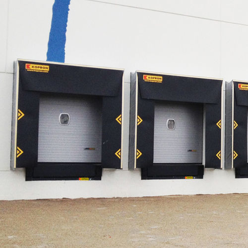 Porta industrial seccionada - LOWERED LINTEL - KOPRON - metálica / automática / com isolamento térmico