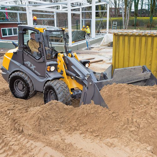 Carregadeira de rodas - AX 1000 - MECALAC Baumaschinen GmbH - para obras / a diesel / articulada