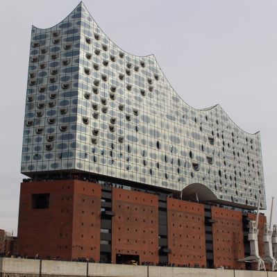 Revestimento de fachada em painéis - ELBPHILHARMONIE HAMBURG - Design Factory cmb - em aço inoxidável / 3D / polido