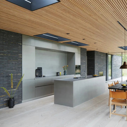 Cozinha contemporânea - Seaside Resort - eggersmann küchen GmbH & Co. KG - em inox escovado / com ilha / escondida