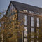 fachada-cortina de pain&eacute;is pr&eacute;-fabricadosTIMBERWALL 50Reynaers Aluminium