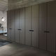 guarda-roupa contemporâneo / em madeira / em couro / com portas de abrir
