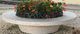floreira em concreto / redonda / com banco integrado / contemporânea