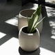 vaso de jardim em cerâmica / em corda / de instalação livre / redondo
