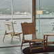 poltrona contemporânea / em couro / em faia / com encosto alto