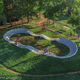 pista de pump track para skatepark / em concreto