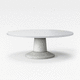 mesa contemporânea / em laminado / com base em concreto / redonda